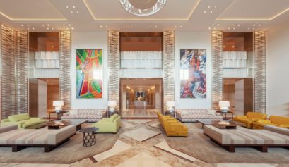 Peter Marino - Cheval Blanc Paris. Hotel Lobby with bright tones and artistic elements.