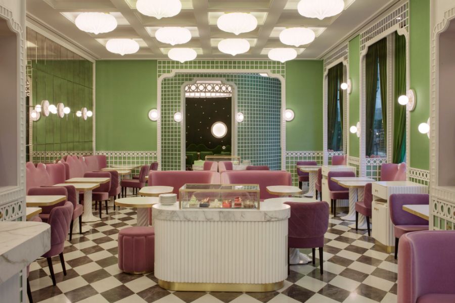India Mahdavi's Ladurée Quais des Bergues has a classic type of restaurant design, featuring vibrant colors with bright lights.