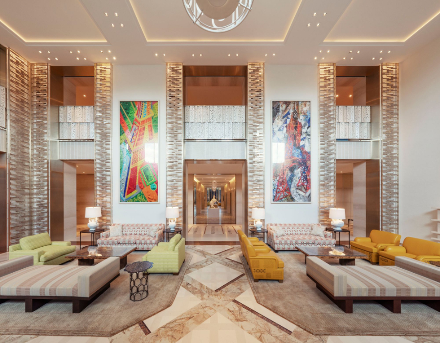 Peter Marino - Cheval Blanc Paris. Majestic hotel lobby with an abundance of bright tones and big paintings.