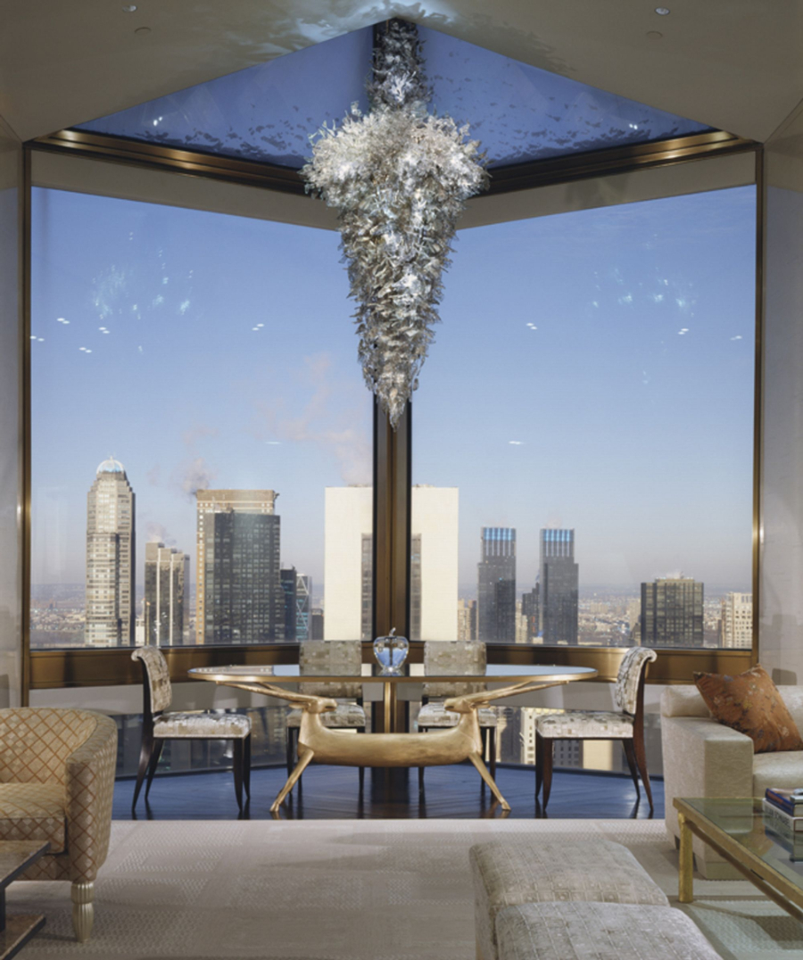 Peter Marino - Four Seasons New York. Lobby Area with a view to the city and a silver chandelier.