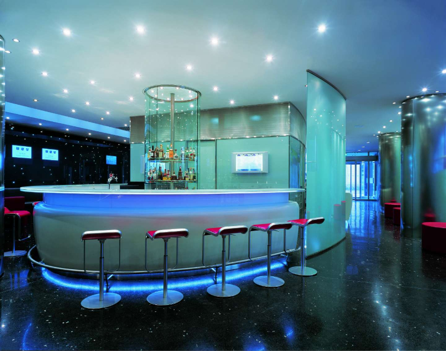 Hospitality Designs by Marco Piva - Una Hotel - Modern Design bar with lighting architecture