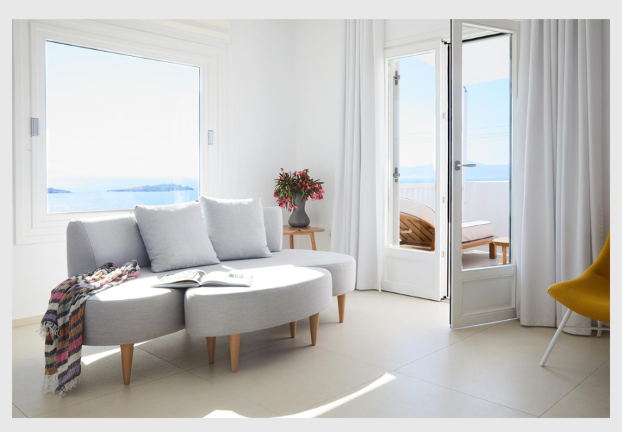 Designhotels, Myconian Kyma, Mykonos, Greece by studio Linda Ehrl  bedroom with a beautiful view to the sea.