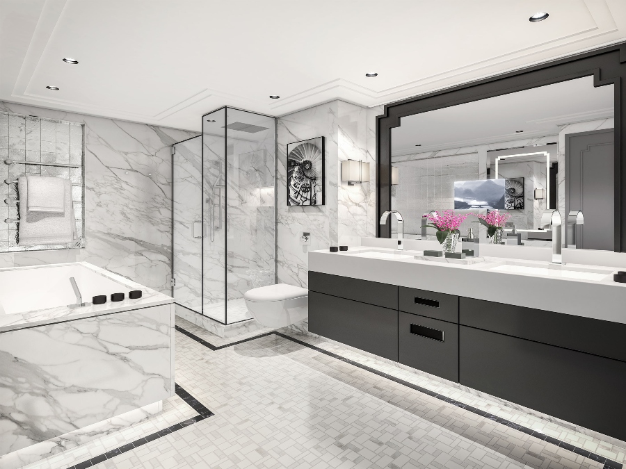 Hotel Decoration With II BY IV DESIGN. The Crystal Mozart hotel bathroom with white marble walls and bathtub has black bathroom cabinets.